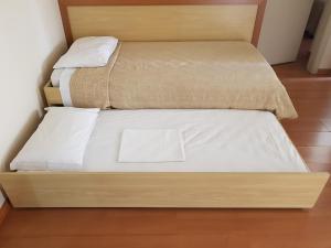 Postel nebo postele na pokoji v ubytování Omega Flat