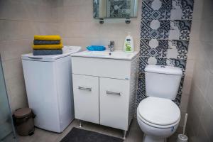Ein Badezimmer in der Unterkunft Reghin Guest House