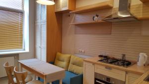Kuchyňa alebo kuchynka v ubytovaní Soprano Apartment Tamanska