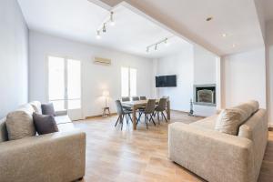 Televízia a/alebo spoločenská miestnosť v ubytovaní Victoria Majesty Apartments