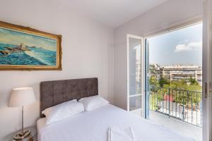 Posteľ alebo postele v izbe v ubytovaní Victoria Majesty Apartments
