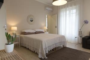 Ένα ή περισσότερα κρεβάτια σε δωμάτιο στο Tocco Barocco - Locazioni Brevi -