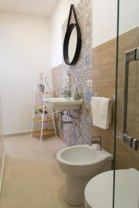 Koupelna v ubytování Tocco Barocco - Locazioni Brevi -
