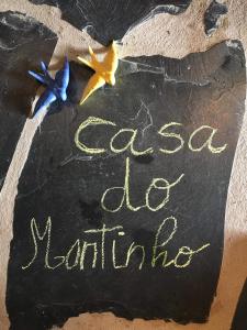 a blackboard with a sign that says sex die latino at Casa do Montinho in Avis
