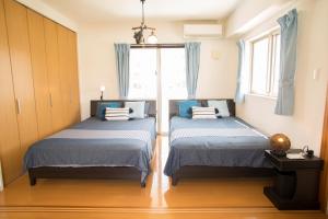 Ένα ή περισσότερα κρεβάτια σε δωμάτιο στο Guesthouse TT Koza +31 φωτογραφίες