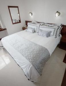 Postel nebo postele na pokoji v ubytování Hotel Arenal