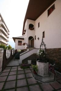 a house with a bike parked in front of it at La Villa in Pratola Peligna