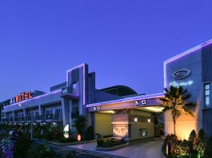 una representación del exterior de un hotel en Hwu Meei Motel en Tainan