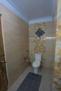 O baie la Ada Waktu Homestay