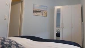 Postel nebo postele na pokoji v ubytování Ferienwohnung "Schonzeit"