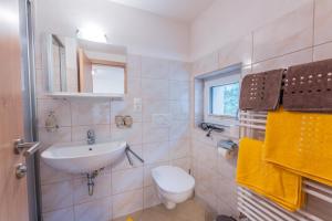 Kúpeľňa v ubytovaní Gästehaus Huben + 22 fotografií