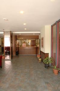 a lobby of a hotel with a reception desk at Kilyos Kale Hotel in Kilyos