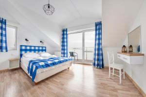 Posteľ alebo postele v izbe v ubytovaní Apartamenty Sun & Snow Seaside Grzybowo