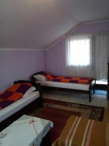 Ένα ή περισσότερα κρεβάτια σε δωμάτιο στο Sobe Seka