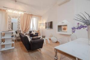 Zona d'estar a Elegante appartmento nel quadrato d'oro a St Tropez