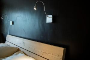 Ένα ή περισσότερα κρεβάτια σε δωμάτιο στο Hotel Alphorn