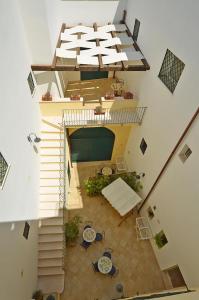 an overhead view of a room with tables and chairs at Casa Branca in Castrignano del Capo