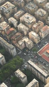 an aerial view of a busy city with cars at Fly B&B in Rome