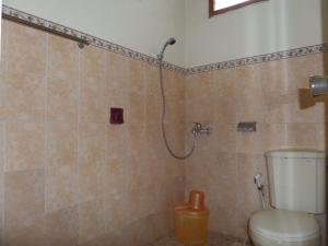 Koupelna v ubytování Armi Hotel Malang