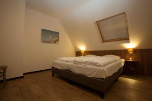 Een bed of bedden in een kamer bij Parc Ganuenta