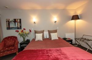 Postel nebo postele na pokoji v ubytování Cranford Oak Motel
