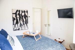 Кровать или кровати в номере Luxury and Beautiful Apartment in Chiado