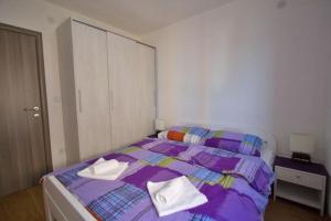 Postel nebo postele na pokoji v ubytování Beachfront House Amaris