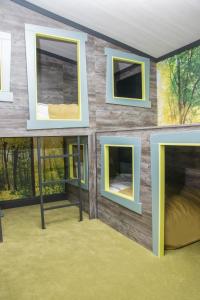 een weergave van een huis met ramen bij Whitecliff Bay Holiday Park in Bembridge