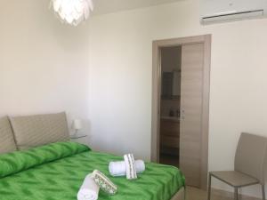 A bed or beds in a room at B&B Adele