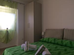 A bed or beds in a room at B&B Adele