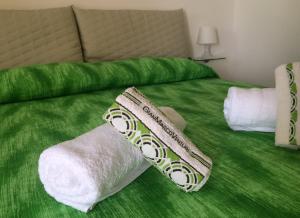 A bed or beds in a room at B&B Adele