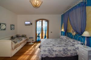 Posteľ alebo postele v izbe v ubytovaní La Casa Gialla A MONTIGNOSO