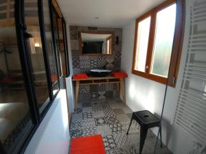 a small bathroom with a sink and a mirror at MAISON JARDIN ET PARKING PRIVé dans GRENOBLE in Grenoble +23 photos