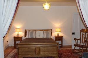 A bed or beds in a room at Bunlin Heights Self Catering Studio