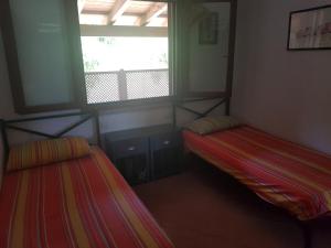 Postel nebo postele na pokoji v ubytování Abba Urci + 37 fotografií