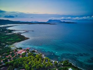 an aerial view of a beach and the ocean at Hotel San Teodoro in San Teodoro