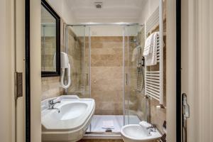 Koupelna v ubytování Hotel dei Quiriti Suite