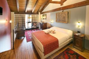Postel nebo postele na pokoji v ubytování Agriturismo Malabaila + 11 fotografií