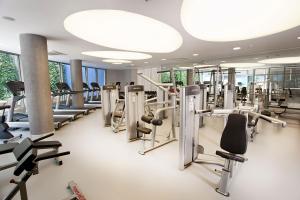 a gym with treadmills and elliptical machines at Opera Hotel Bosphorus in Istanbul