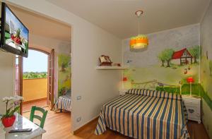 Posteľ alebo postele v izbe v ubytovaní La Casa Gialla A MONTIGNOSO