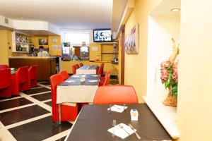 TV a/nebo společenská místnost v ubytování Cervara Park Hotel