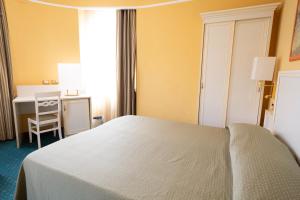 Postel nebo postele na pokoji v ubytování Cervara Park Hotel