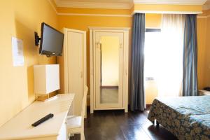 TV a/nebo společenská místnost v ubytování Cervara Park Hotel