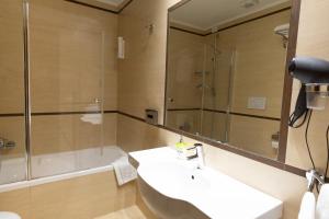Koupelna v ubytování Cervara Park Hotel
