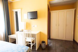 TV a/nebo společenská místnost v ubytování Cervara Park Hotel