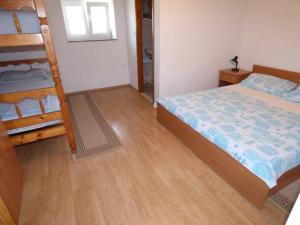 Ein Bett oder Betten in einem Zimmer der Unterkunft Apartments Branko Nin