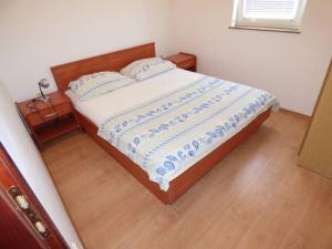 Ein Bett oder Betten in einem Zimmer der Unterkunft Apartments Branko Nin