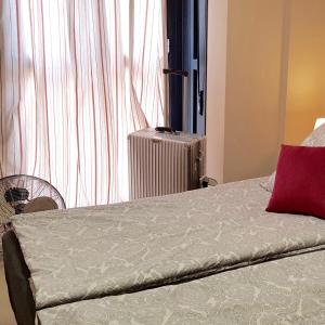 En eller flere senge i et værelse på Casa Saphia de Melilla
