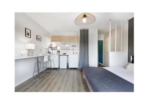 Η κουζίνα ή μικρή κουζίνα στο Studio Diane Cugnaux Toulouse St Simon proche Thales, Airbus & Basso Cambo +3 φωτογραφίες