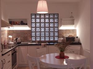 A kitchen or kitchenette at Kálium Vendégház